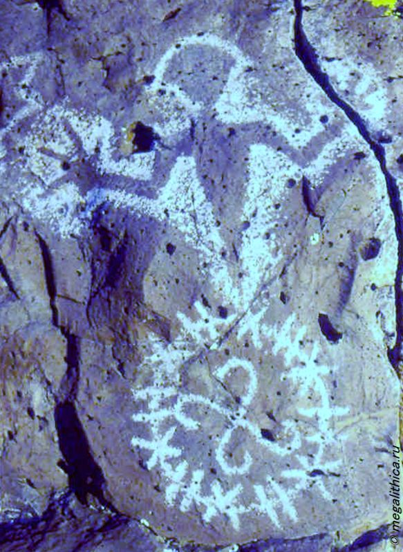Rock painting of shaman in Moab, Utah сш