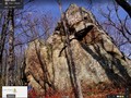 камень