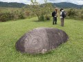 Watu Molindo monolith with enigmatic face etched on surface, near Bulili village, Besoa Valley