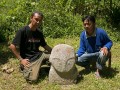07 Small statue with archaeologist Iksam Djorimi and local guide, near Gintu village, Bada Valley