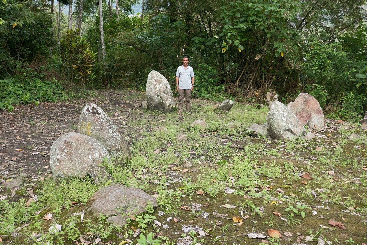 Oboka monoliths with archaeologist Iksam Djorimi, near Tamadue village, Napu Valley