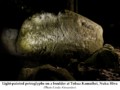 Light-painted petroglyphs on a boulder at Tohua Kamuihei, Nuku Hiva